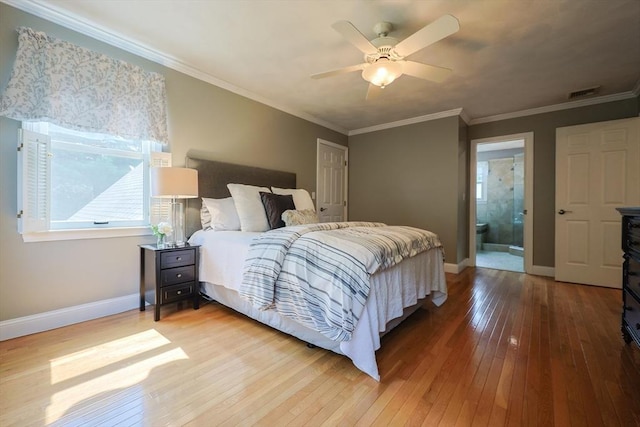 70 Huntsbridge Rd, North Attleboro, MA 02760 - bedroom featuring multiple windows, hardwood / wood-style floors, ornamental molding, ceiling fan, and ensuite bath