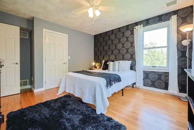 70 Huntsbridge Rd, North Attleboro, MA 02760 - bedroom featuring wood finished floors, wallpapered walls, and ceiling fan