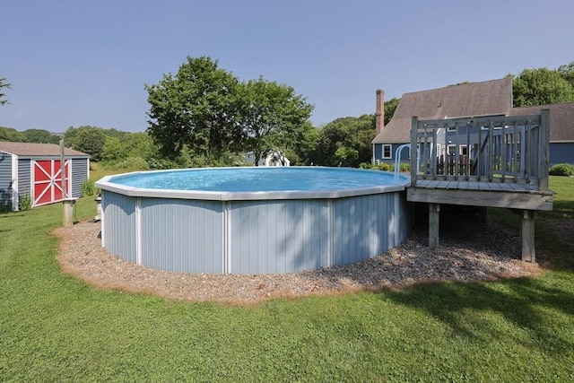 70 Huntsbridge Rd, North Attleboro, MA 02760 - swimming pool with a wooden deck, a shed, and a yard