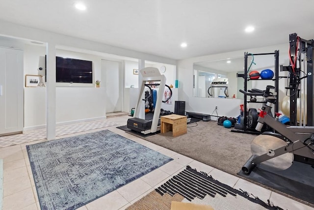 workout area with recessed lighting and tile patterned floors