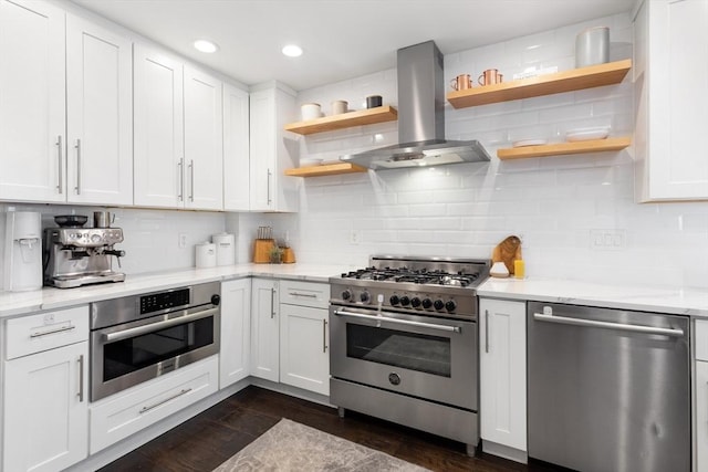kitchen with open shelves, white cabinetry, tasteful backsplash, island exhaust hood, and appliances with stainless steel finishes