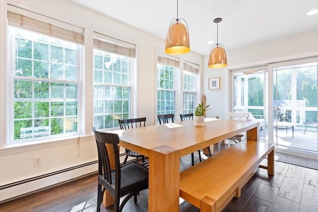dining space featuring recessed lighting, baseboard heating, and hardwood / wood-style floors