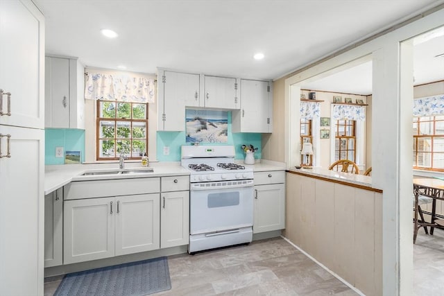 68 Fifth Ave, Barnstable, MA 02601 - kitchen with gas range gas stove, light countertops, and recessed lighting