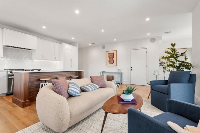 60 Williams St Unit 302, Boston, MA 02130 - living area with visible vents, light wood-style flooring, and recessed lighting