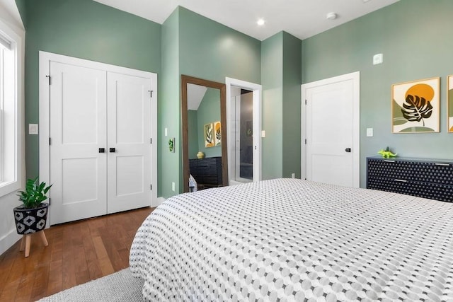 34 Alpha Rd Unit 3, Boston, MA 02124 - bedroom featuring dark wood-style flooring and a closet