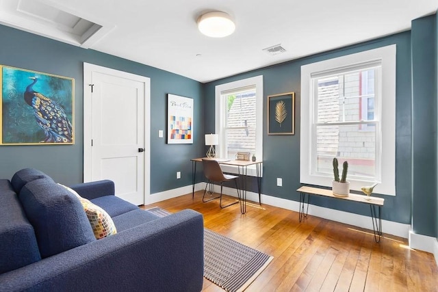 34 Alpha Rd Unit 3, Boston, MA 02124 - living area with baseboards and hardwood / wood-style flooring