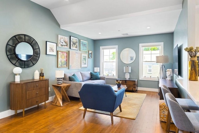 34 Alpha Rd Unit 3, Boston, MA 02124 - living area featuring wood finished floors, baseboards, recessed lighting, and lofted ceiling