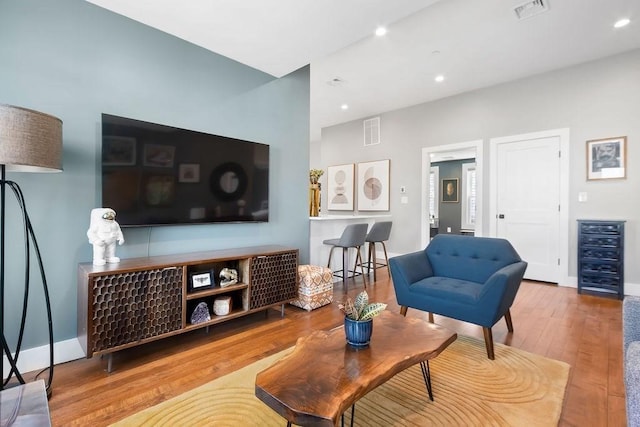 34 Alpha Rd Unit 3, Boston, MA 02124 - living area with beverage cooler, hardwood / wood-style floors, baseboards, and recessed lighting