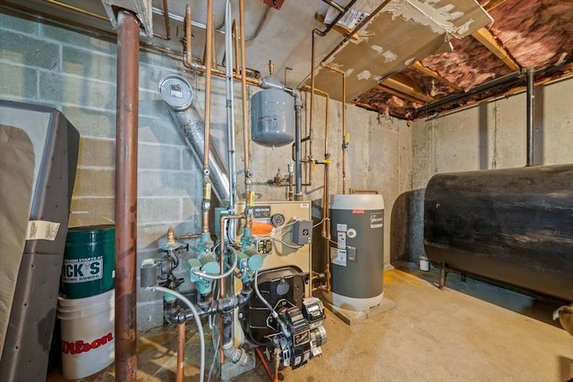 utilities featuring heating fuel, water heater, and a heating unit