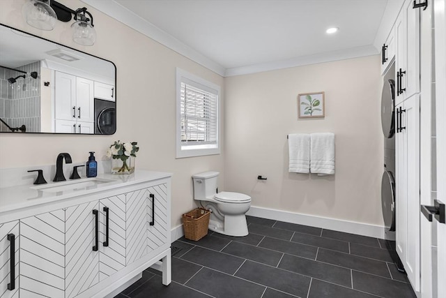 1 Wall St, Quincy, MA 02169 - bathroom featuring stacked washer / drying machine, vanity, a shower, tile patterned flooring, and ornamental molding