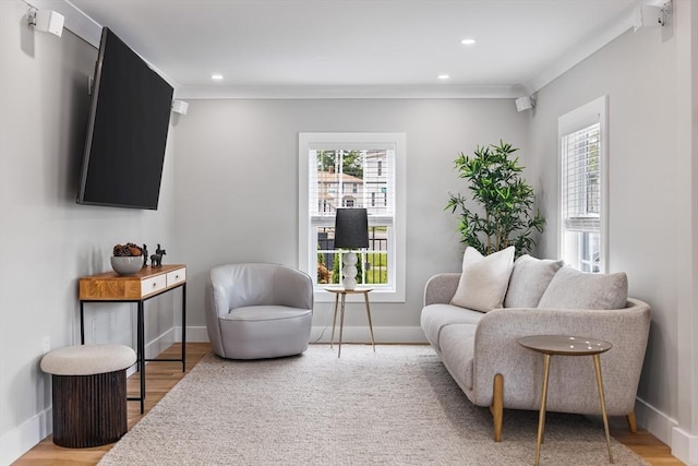 1 Wall St, Quincy, MA 02169 - living area featuring plenty of natural light, wood finished floors, recessed lighting, and crown molding