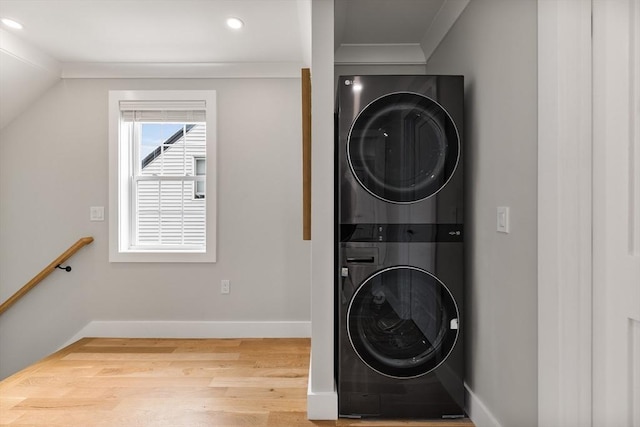 1 Wall St, Quincy, MA 02169 - laundry room with estacked washer and dryer, wood finished floors, recessed lighting, and ornamental molding