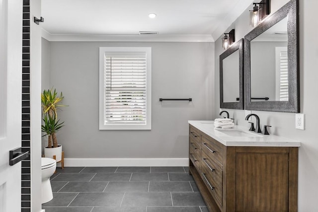 1 Wall St, Quincy, MA 02169 - full bath with double vanity, ornamental molding, and tile patterned floors