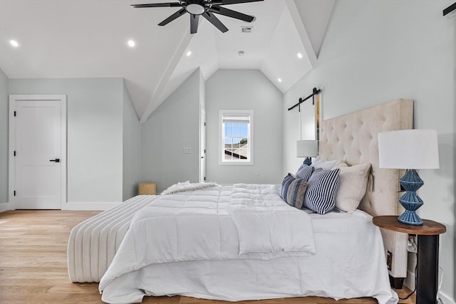 1 Wall St, Quincy, MA 02169 - bedroom with a barn door, light wood-style flooring, recessed lighting, vaulted ceiling, and a ceiling fan
