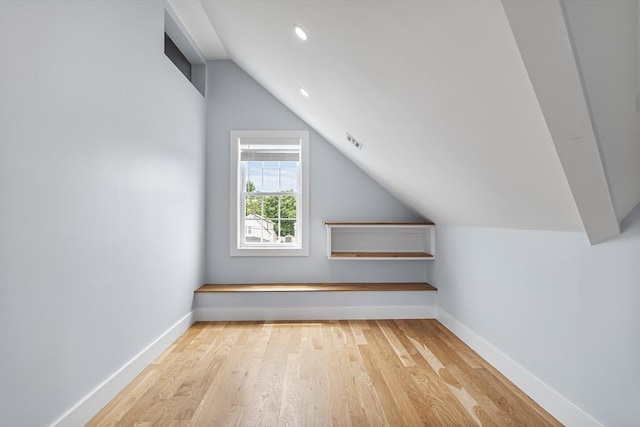 1 Wall St, Quincy, MA 02169 - additional living space with vaulted ceiling, wood finished floors, and recessed lighting