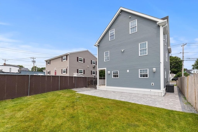 1 Wall St, Quincy, MA 02169 - back of house featuring a fenced backyard and a patio