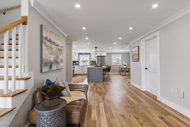 1 Wall St, Quincy, MA 02169 - living area featuring ornamental molding, stairway, recessed lighting, and light wood-type flooring
