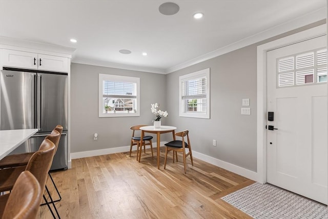 1 Wall St, Quincy, MA 02169 - dining area featuring crown molding, light wood finished floors, and recessed lighting