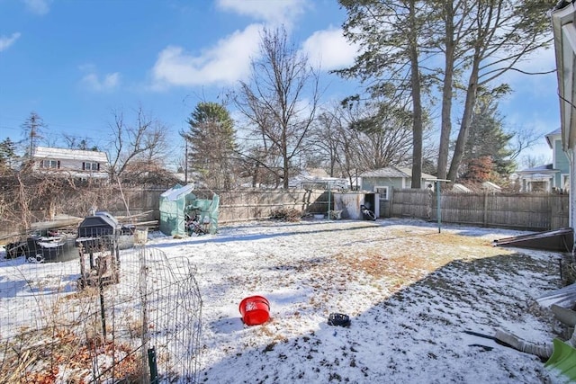 view of yard covered in snow