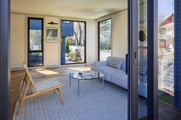 interior space featuring baseboards and wood finished floors