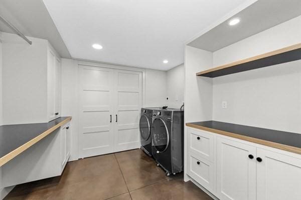 washroom with separate washer and dryer and recessed lighting