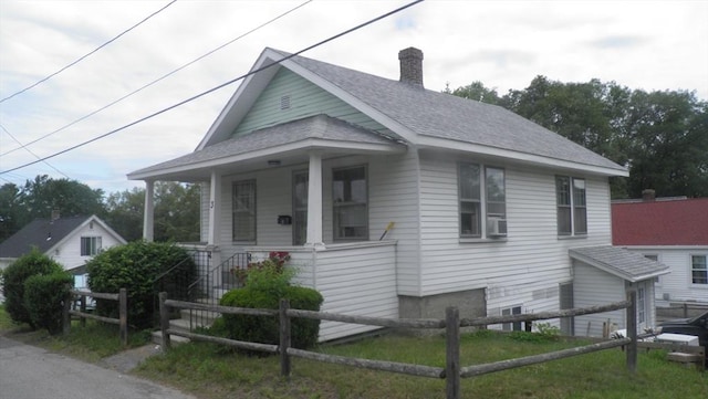 bungalow-style house featuring covered porch