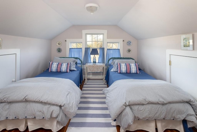 bedroom with vaulted ceiling