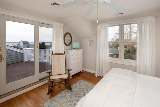 bedroom with access to exterior, ceiling fan, lofted ceiling, and hardwood / wood-style flooring