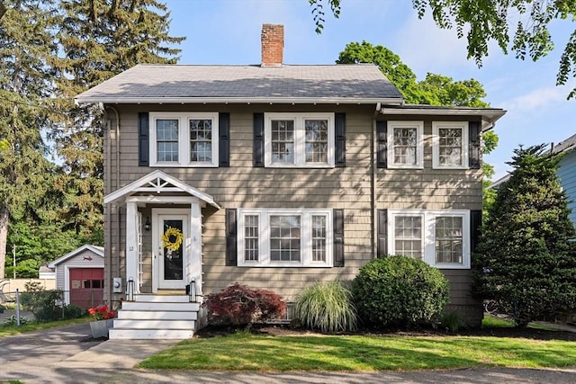 12 Moreland Rd, Quincy, MA 02169 - colonial inspired home featuring a chimney, an outbuilding, and a shingled roof