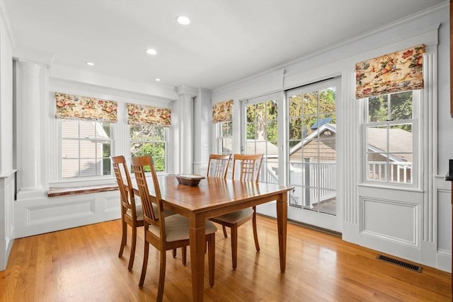 12 Moreland Rd, Quincy, MA 02169 - dining space with crown molding, decorative columns, light wood finished floors, and recessed lighting
