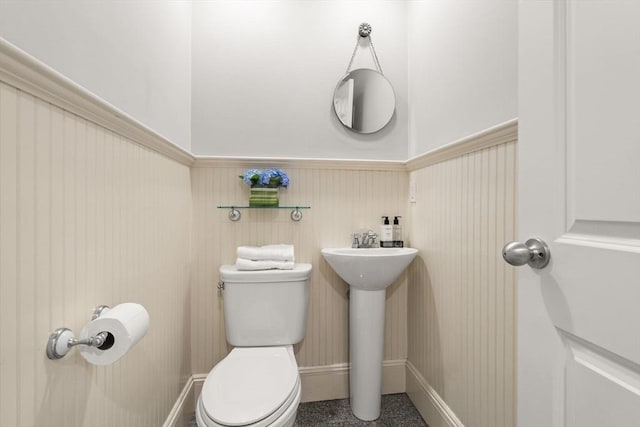 12 Moreland Rd, Quincy, MA 02169 - bathroom featuring toilet and wainscoting