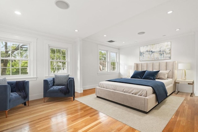 12 Moreland Rd, Quincy, MA 02169 - bedroom with multiple windows, ornamental molding, light wood-style flooring, and recessed lighting