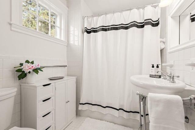 12 Moreland Rd, Quincy, MA 02169 - full bath with tile walls and shower / bath combo with shower curtain
