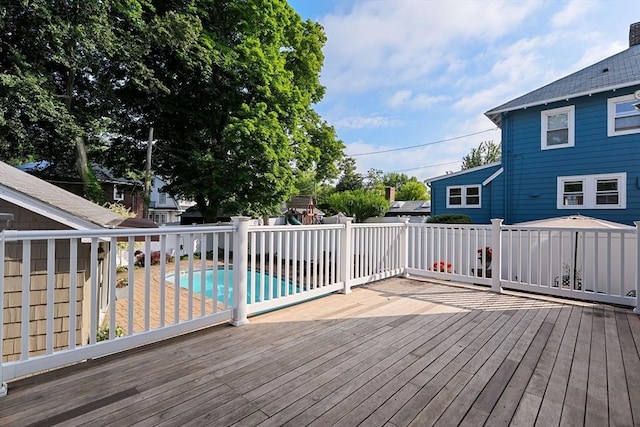 12 Moreland Rd, Quincy, MA 02169 - wooden deck with a playground