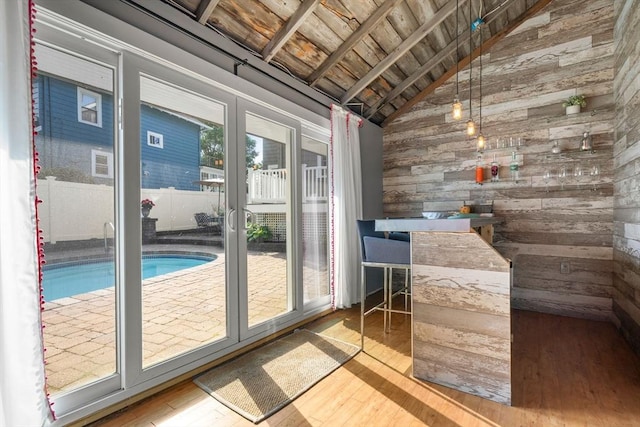 12 Moreland Rd, Quincy, MA 02169 - doorway to outside featuring wooden walls, wood ceiling, vaulted ceiling, and hardwood / wood-style floors