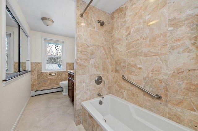 full bathroom featuring tile patterned flooring, tiled shower / bath combo, vanity, a baseboard radiator, and toilet