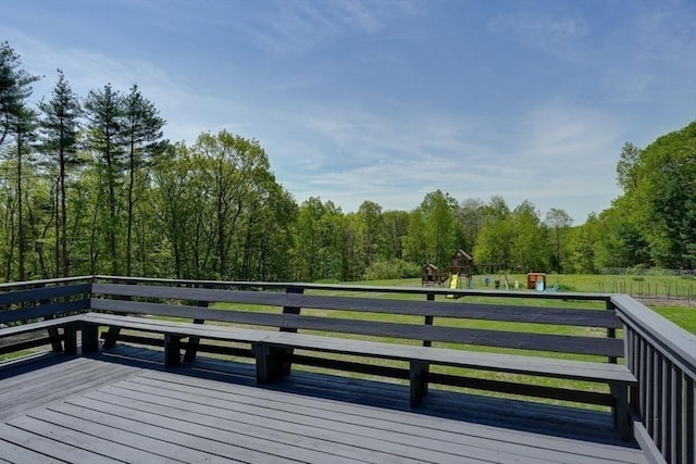 161 Randall Rd, Berlin, MA 01503 - deck with a playground and a wooded view