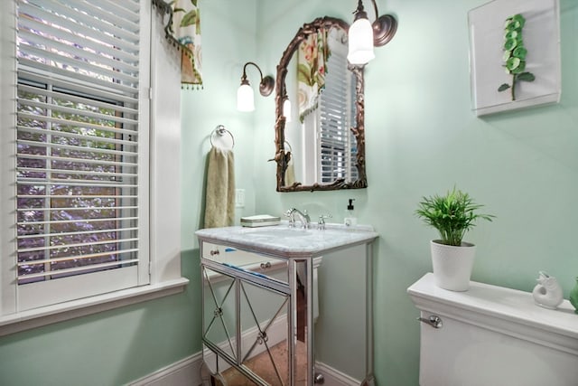 bathroom featuring sink and toilet