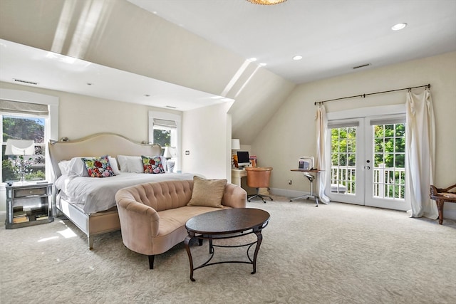 bedroom featuring access to outside, lofted ceiling, and light carpet