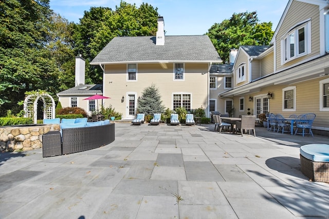 exterior space featuring an outdoor living space and a patio