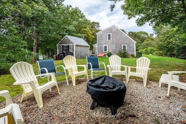 view of patio with an outbuilding