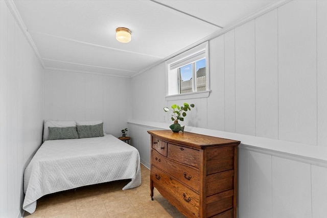bedroom with a decorative wall