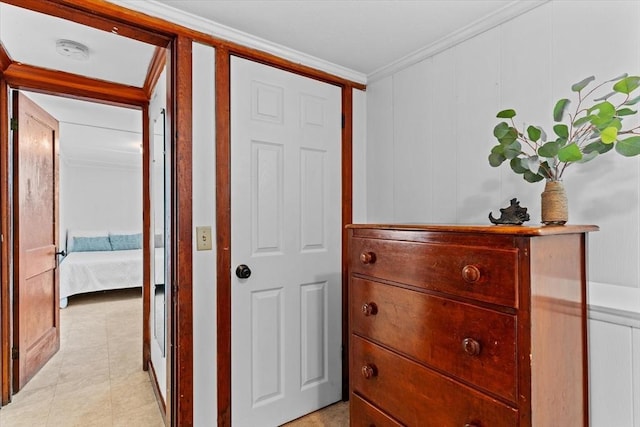 corridor featuring crown molding