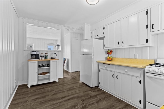kitchen featuring light countertops, dark wood-style flooring, white cabinets, and white appliances
