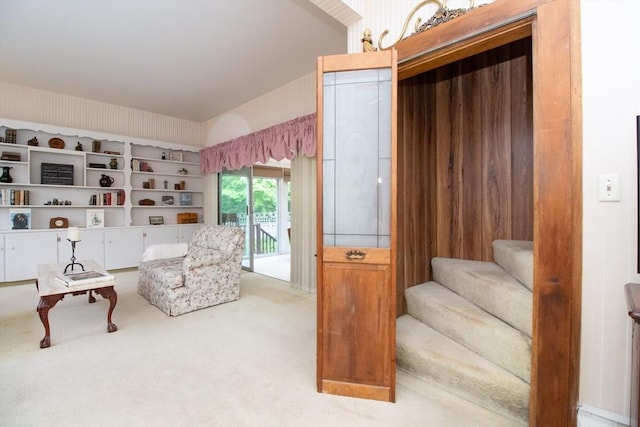 living area with carpet