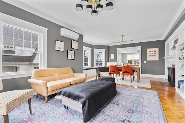 living area featuring a fireplace with flush hearth, crown molding, a chandelier, baseboards, and a wall mounted air conditioner
