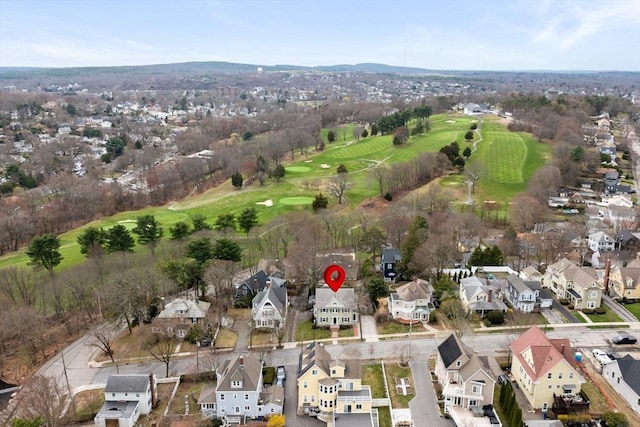 bird's eye view featuring a mountain view, a residential view, and view of golf course