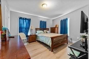 bedroom featuring wood finished floors