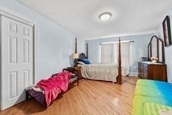 bedroom with wood finished floors