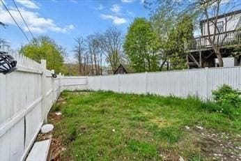 view of yard featuring a fenced backyard